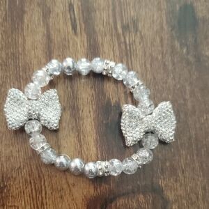 Handmade by my daughter. Silver Sparkling Bow Beaded Bracelet